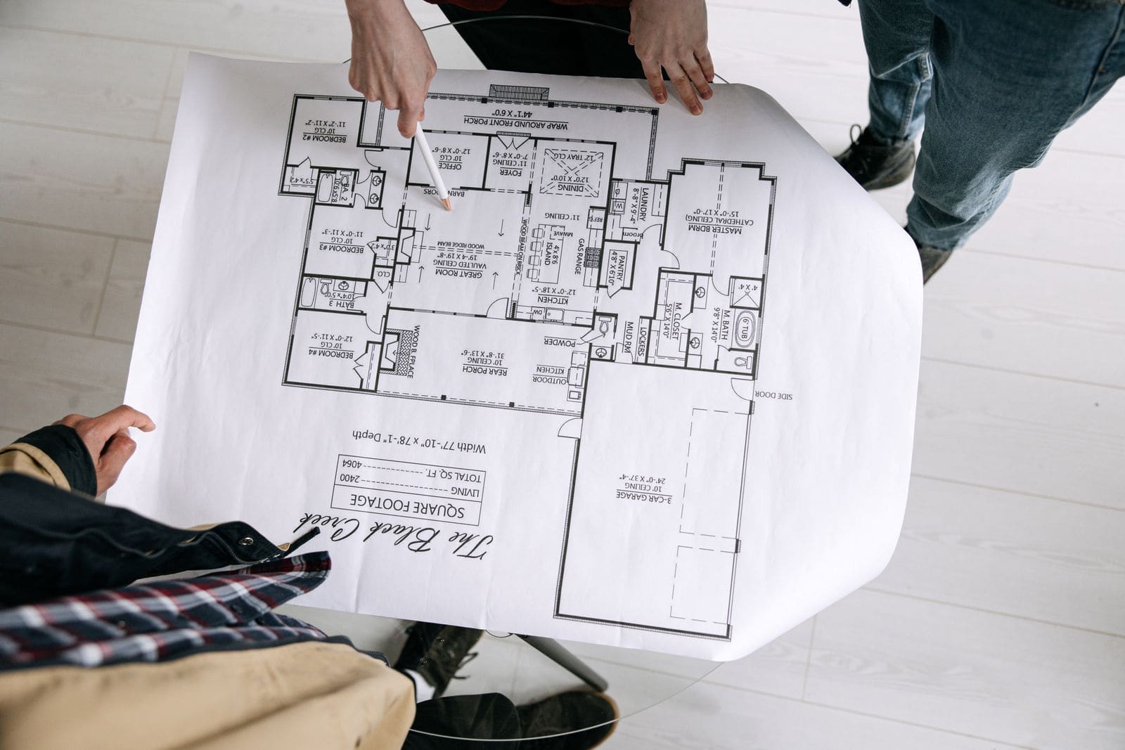 Architect reviewing a floor plan with a colleague