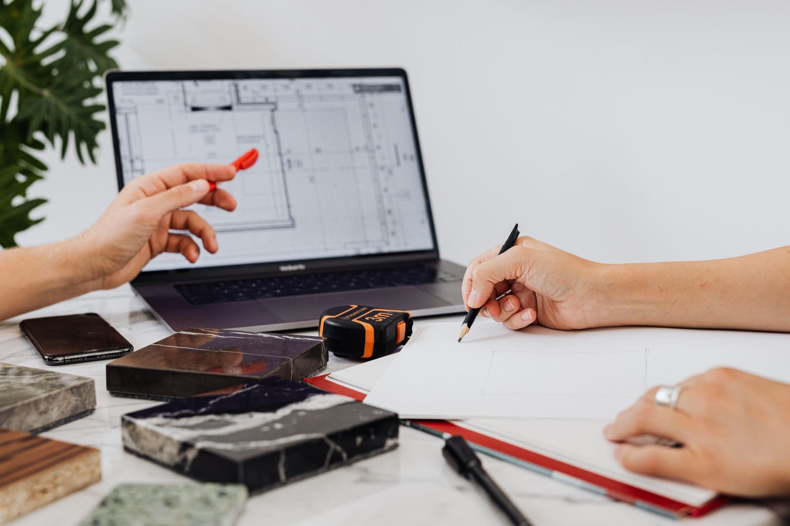 Interior designer sketching a detail by hand